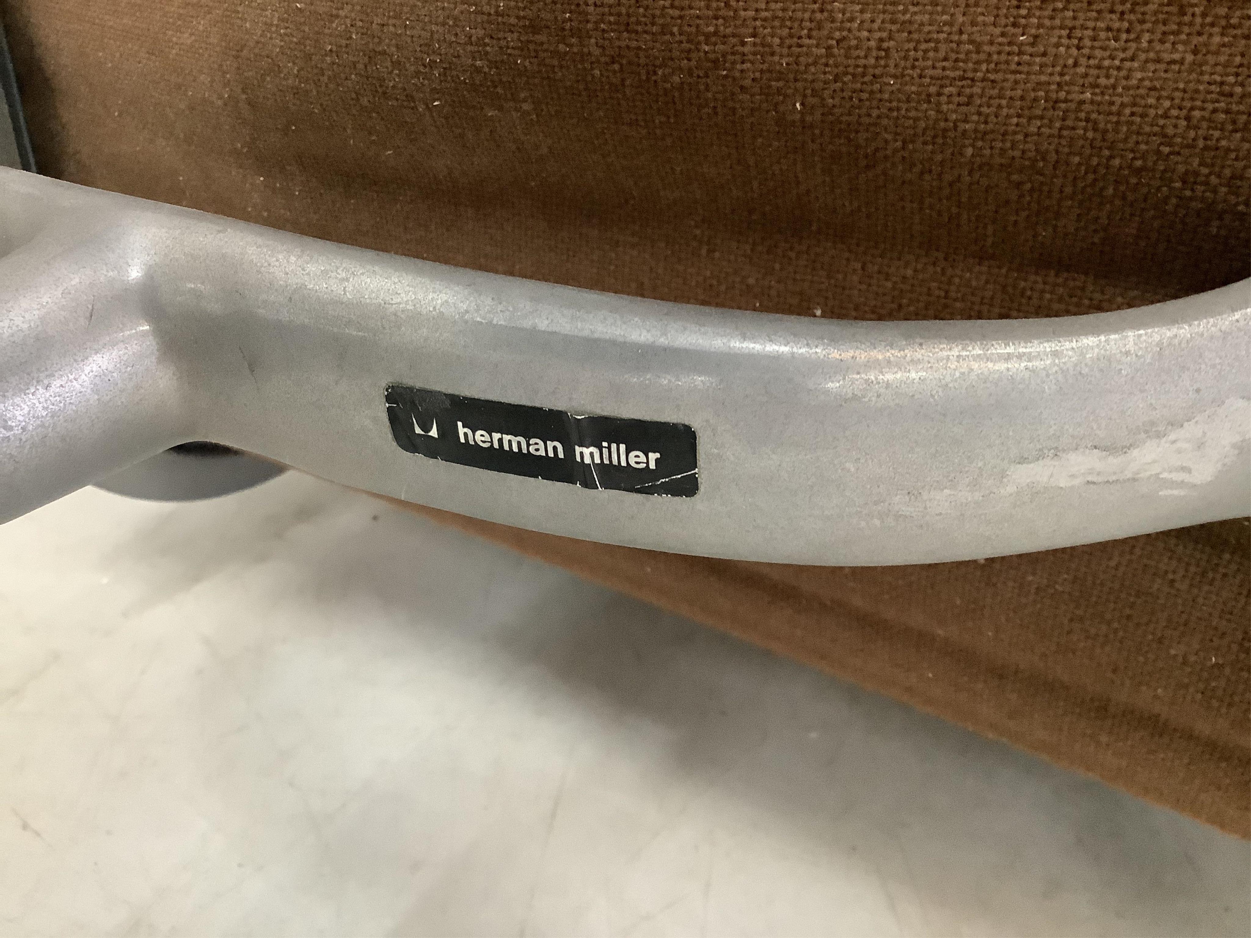 A Herman Miller Eames EA108 chair, width 58cm, depth 50cm, height 84cm